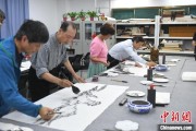 事业编制两岸艺术家在安徽“共绘一幅画”